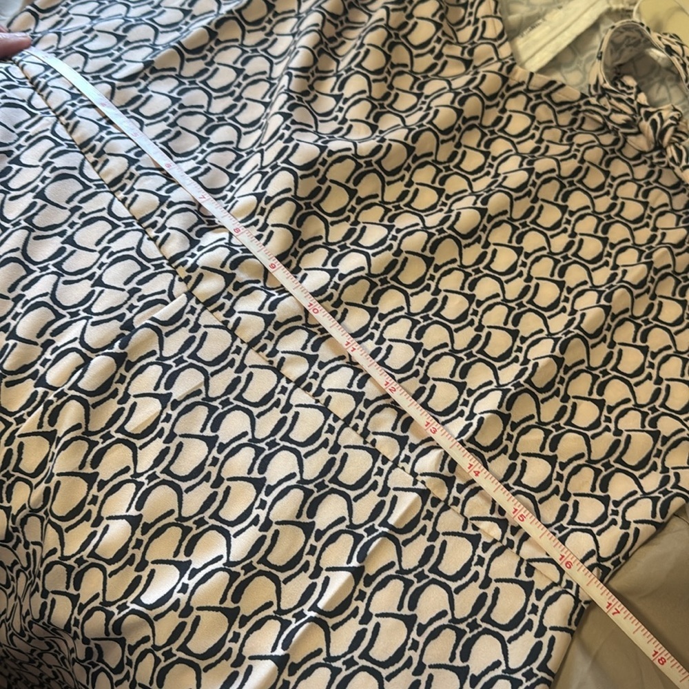 Elegant Patterned Jumpsuit in tan with sash that ties at waist - Picture 8 of 10